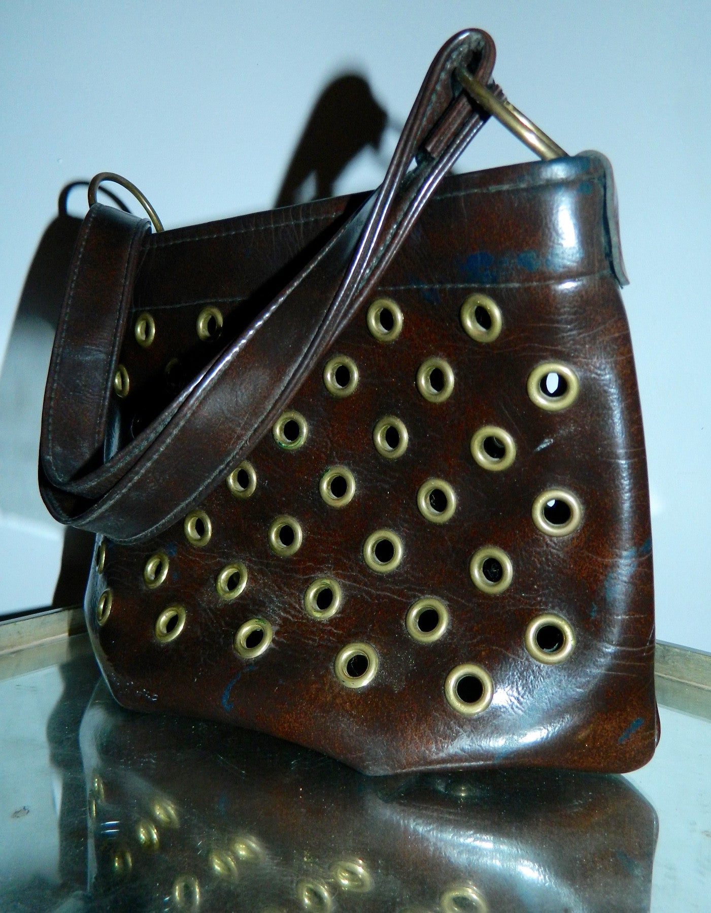 MOD handbag vintage 1960s brown vinyl grommeted purse / brass O rings