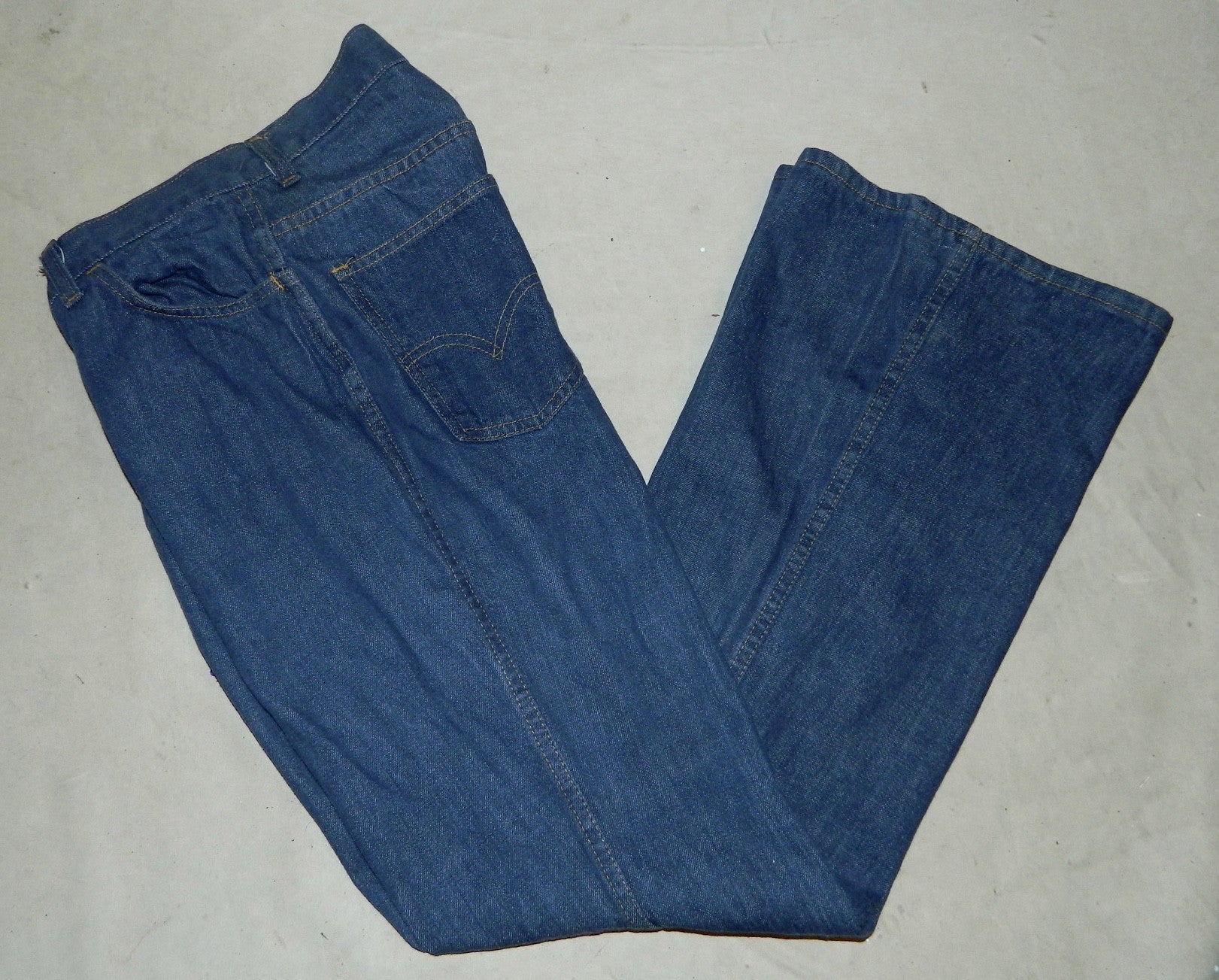 vintage 1970s jeans LEVIS Big E bell bottoms dark denim Talon 42