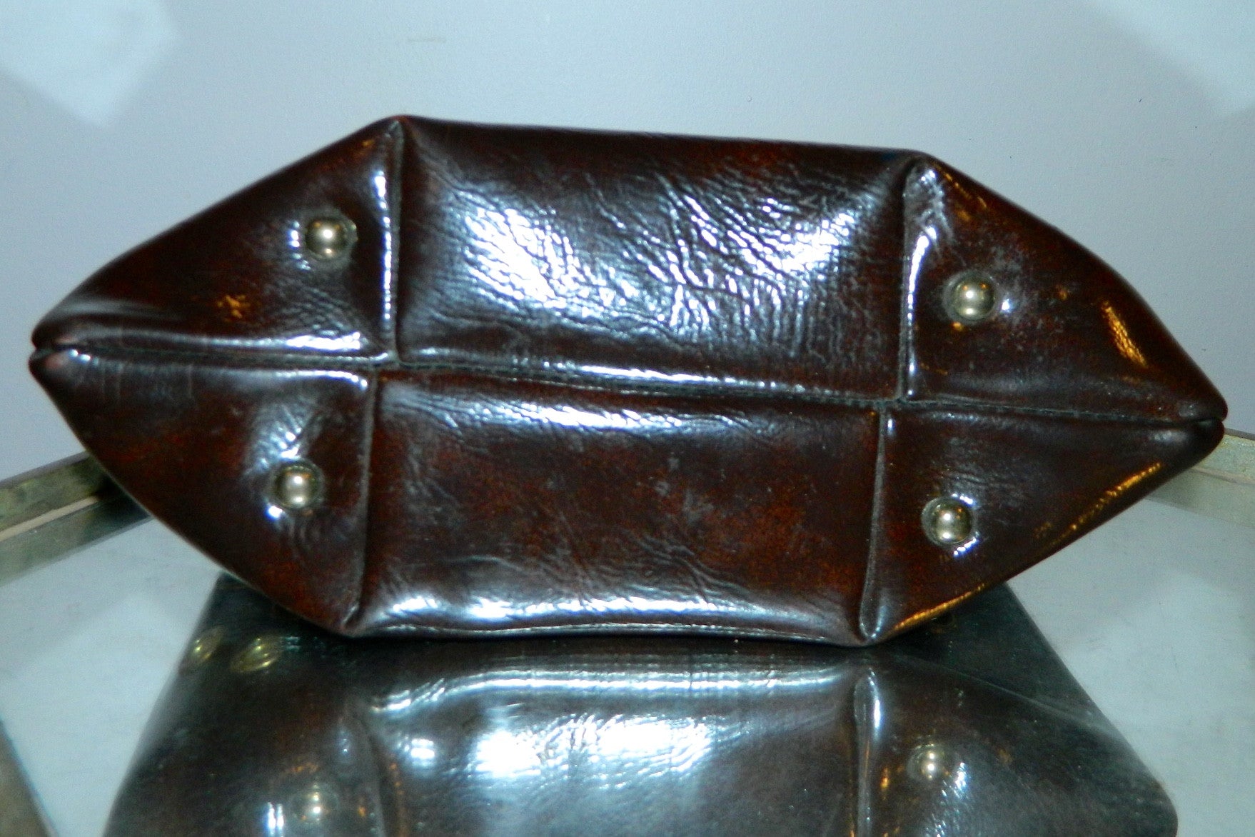 MOD handbag vintage 1960s brown vinyl grommeted purse / brass O rings